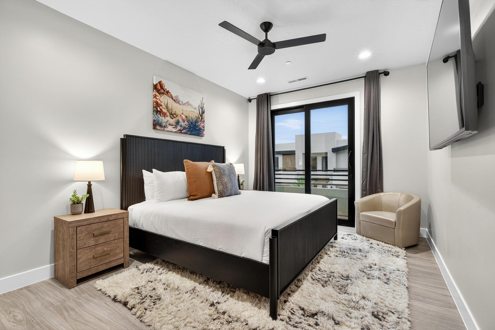 Bedroom featuring light wood-style flooring, ceiling fan, and recessed lighting