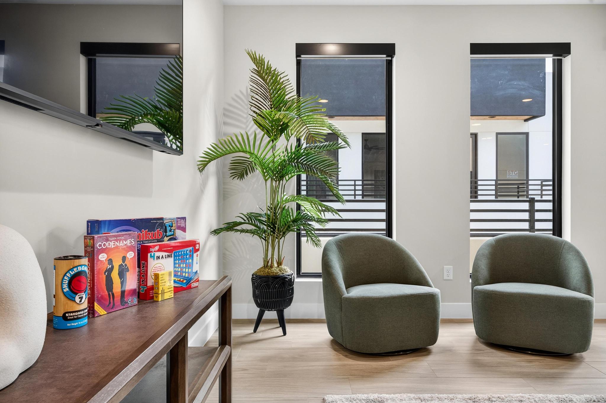 Sitting room featuring wood finished floors and baseboards