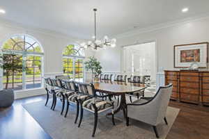 Elegant formal dining room offers exquisite detailing and is spacious enough for large dinner parties.