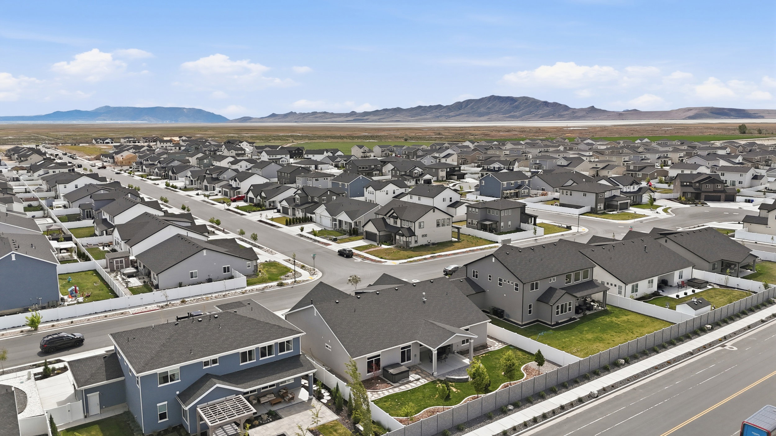 Aerial perspective of suburban area featuring mountains