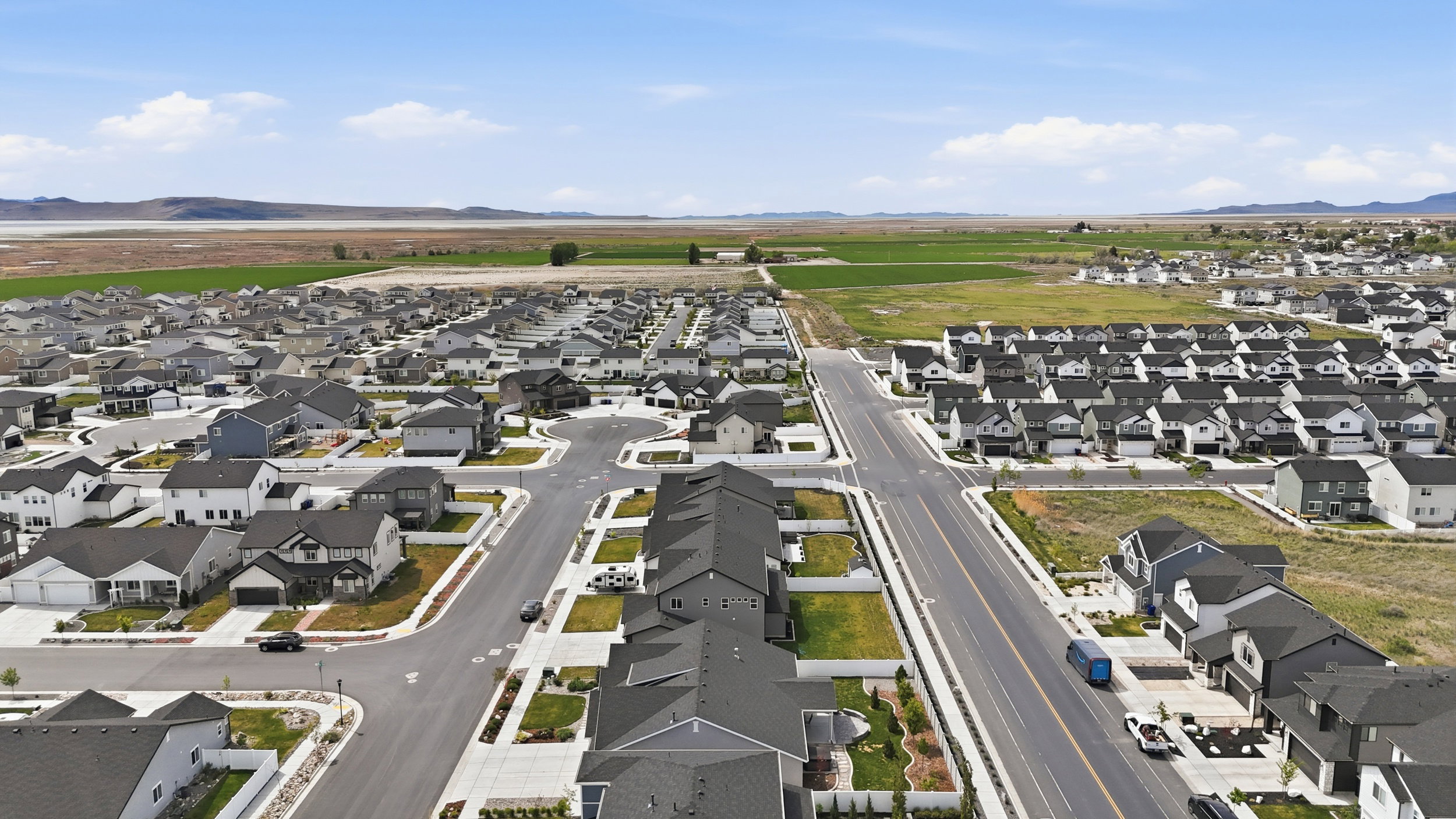 Aerial view of residential area with a mountain backdrop