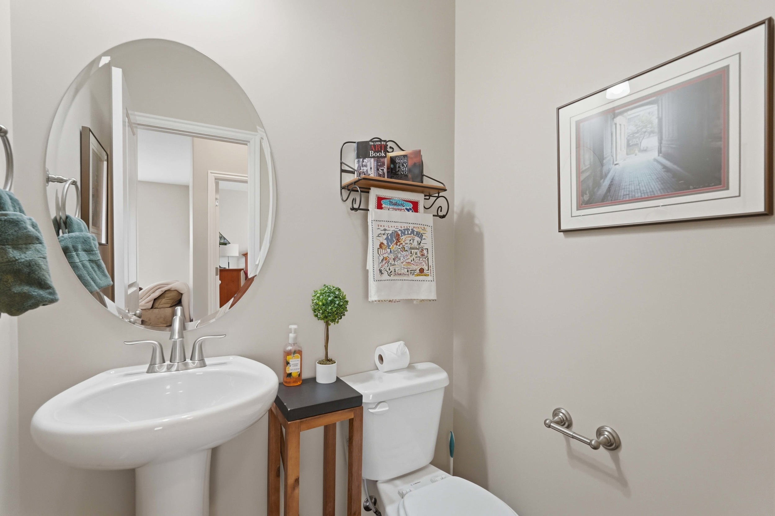 Half bathroom featuring toilet and a sink
