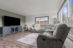 Living room featuring large windows for natural light