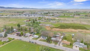 Aerial view of property location with nearby rural area landscape