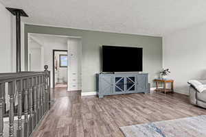 Living room area with wood like laminate floors
