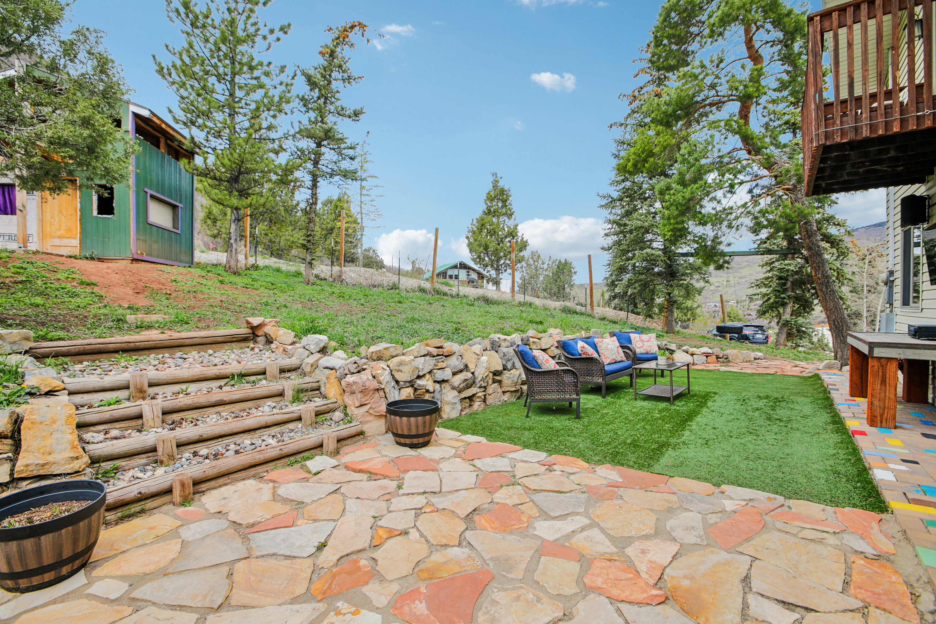 View of green lawn featuring a patio area