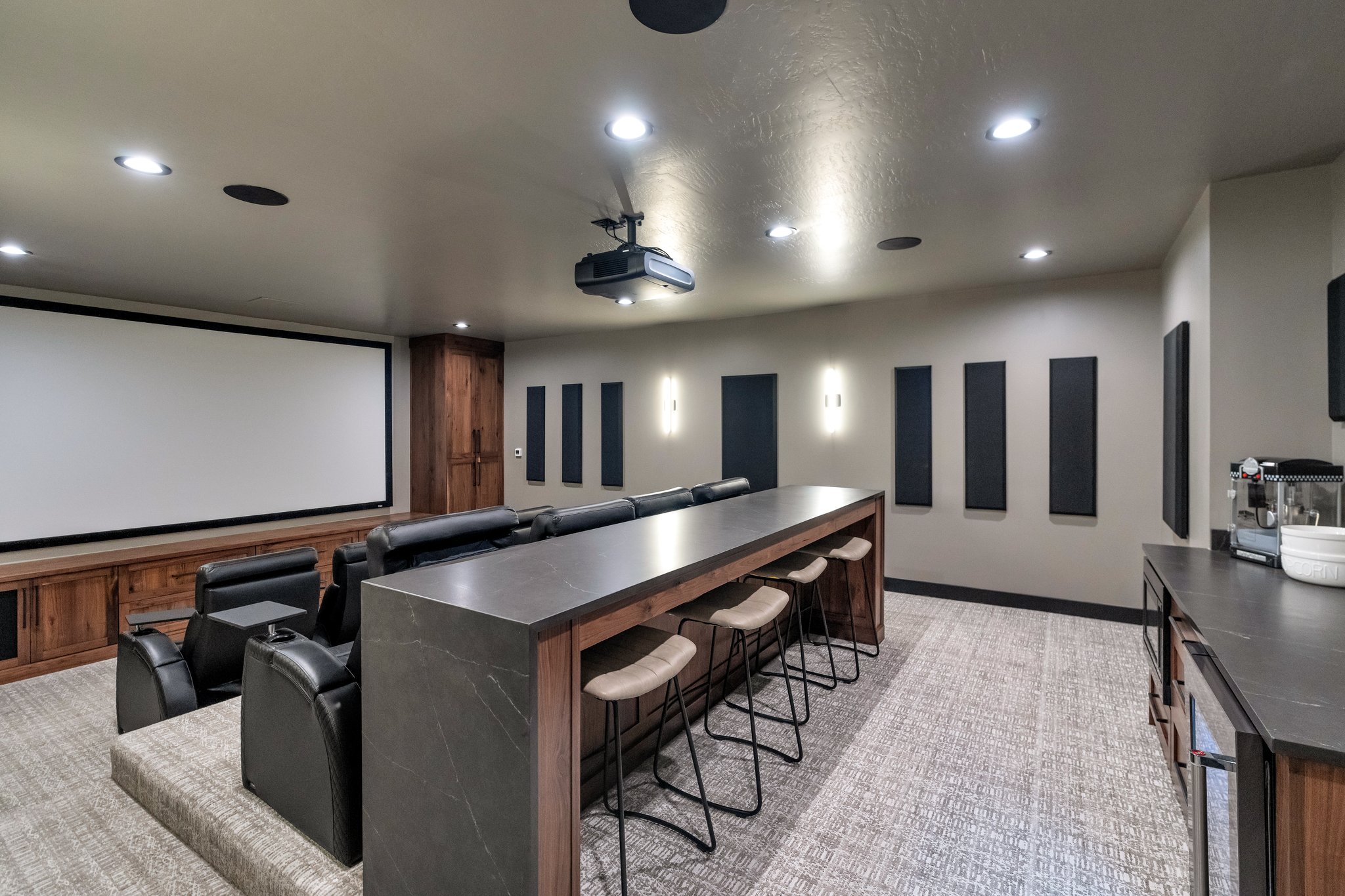 Home theater with recessed lighting, light colored carpet, and wine cooler