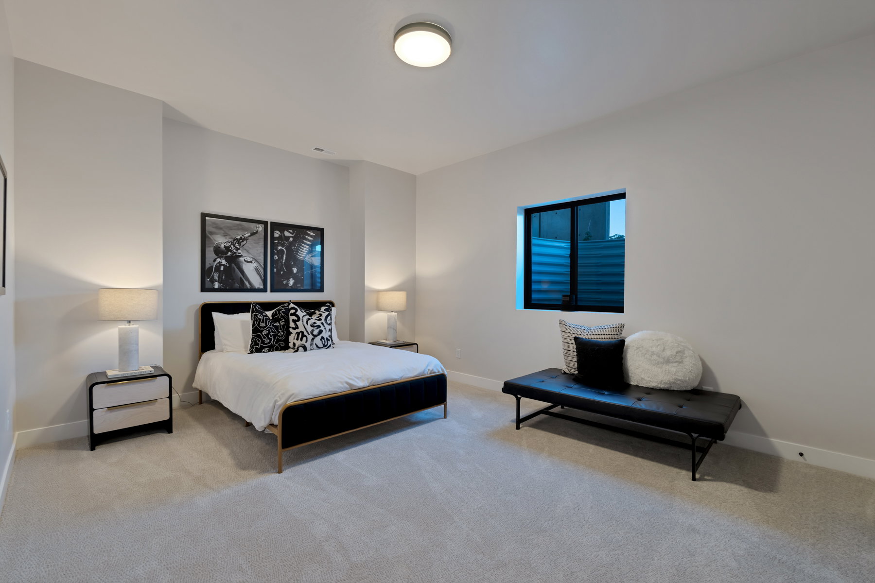 Bedroom with carpet flooring and baseboards