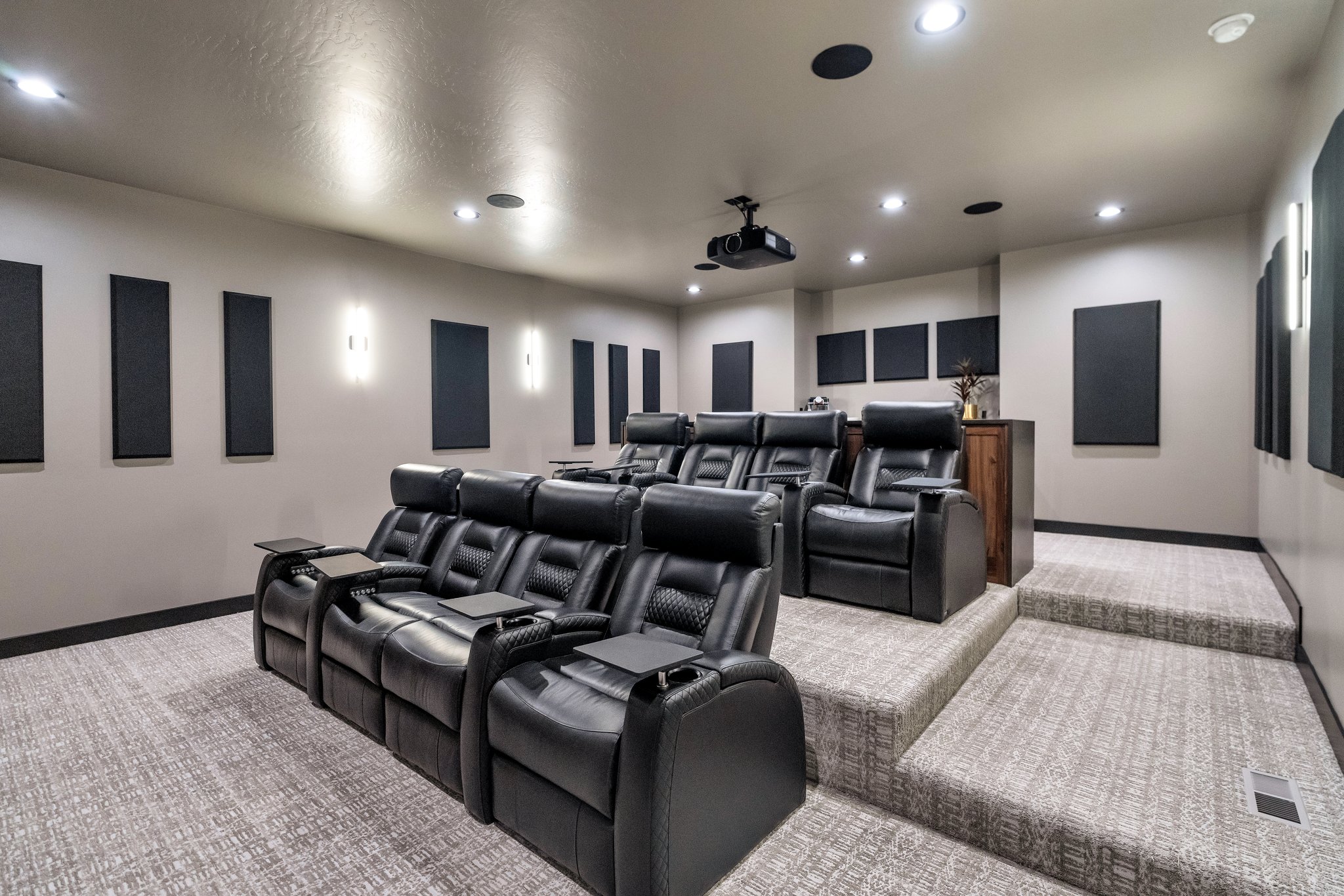 Home theater featuring light colored carpet and recessed lighting