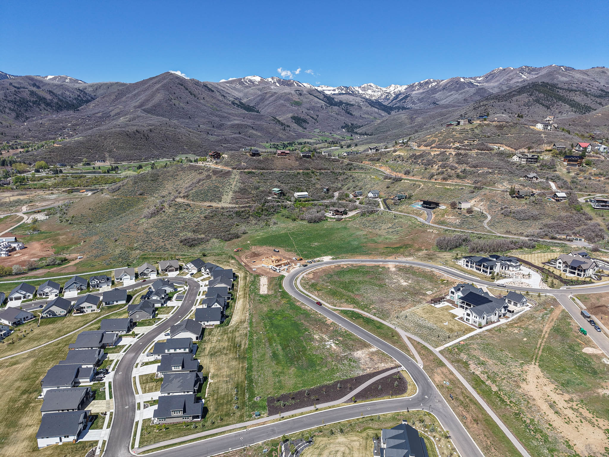 View of property location with nearby suburban area and mountains