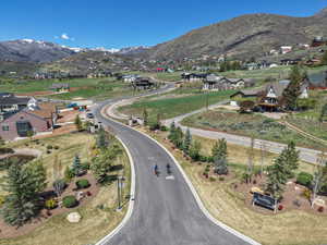 Aerial overview of property's location with a mountainous background