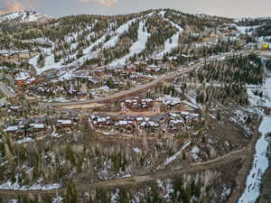 Snowy aerial view with a mountain view