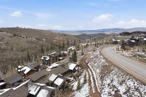 Aerial view of residential area with a mountainous background
