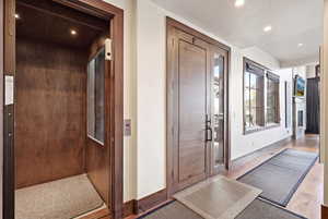 Doorway to property featuring elevator