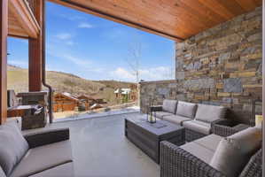 View of patio / terrace featuring an outdoor lounge area and a mountain view