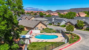 Community pool featuring a patio area and a mountain view