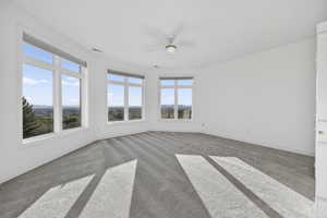 Bedroom featuring a ceiling fan, recessed lighting, and carpet flooring