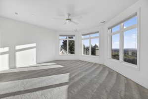 Bedroom with ceiling fan, recessed lighting, and carpet