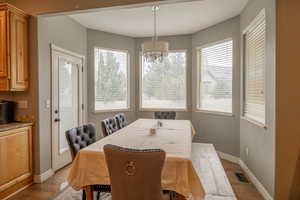 Dining room featuring wood finished floors