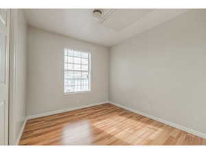 bedroom featuring light wood-style floors