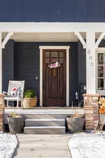 Property entrance featuring a porch