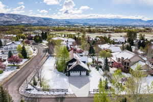 Aerial view of residential area featuring a mountain backdrop