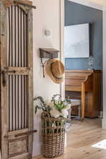 Detailed view of wood finished floors and radiator
