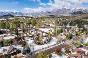 Aerial view of residential area featuring mountains