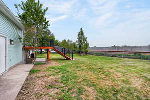 Fenced yard with stairway