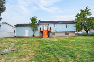 Rear view of property featuring stairway and french doors
