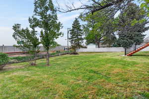View of yard with stairway