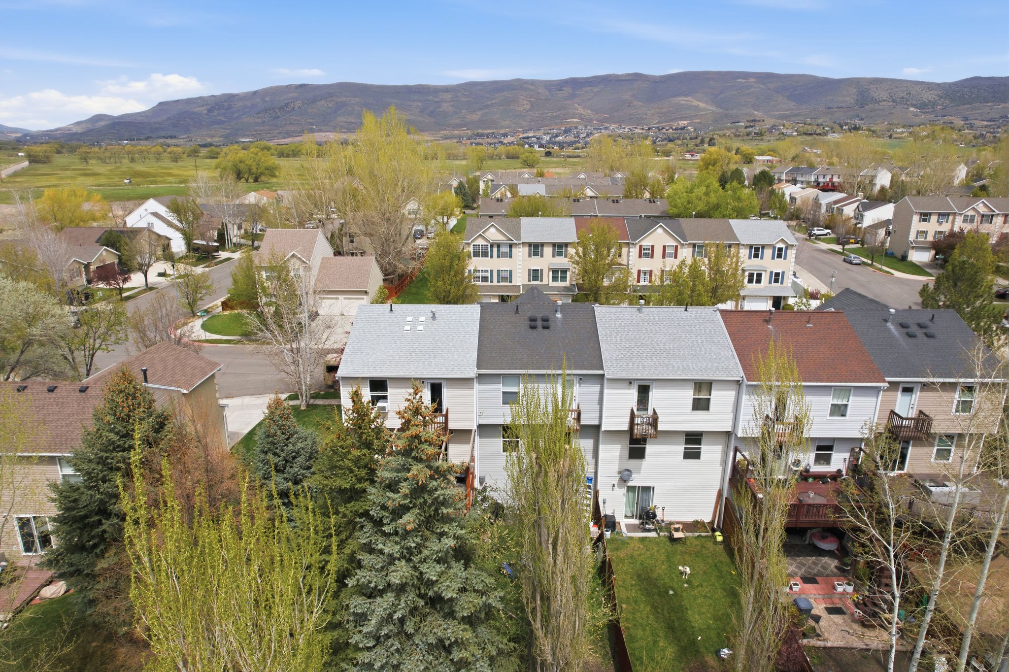 Aerial view of residential area with mountains