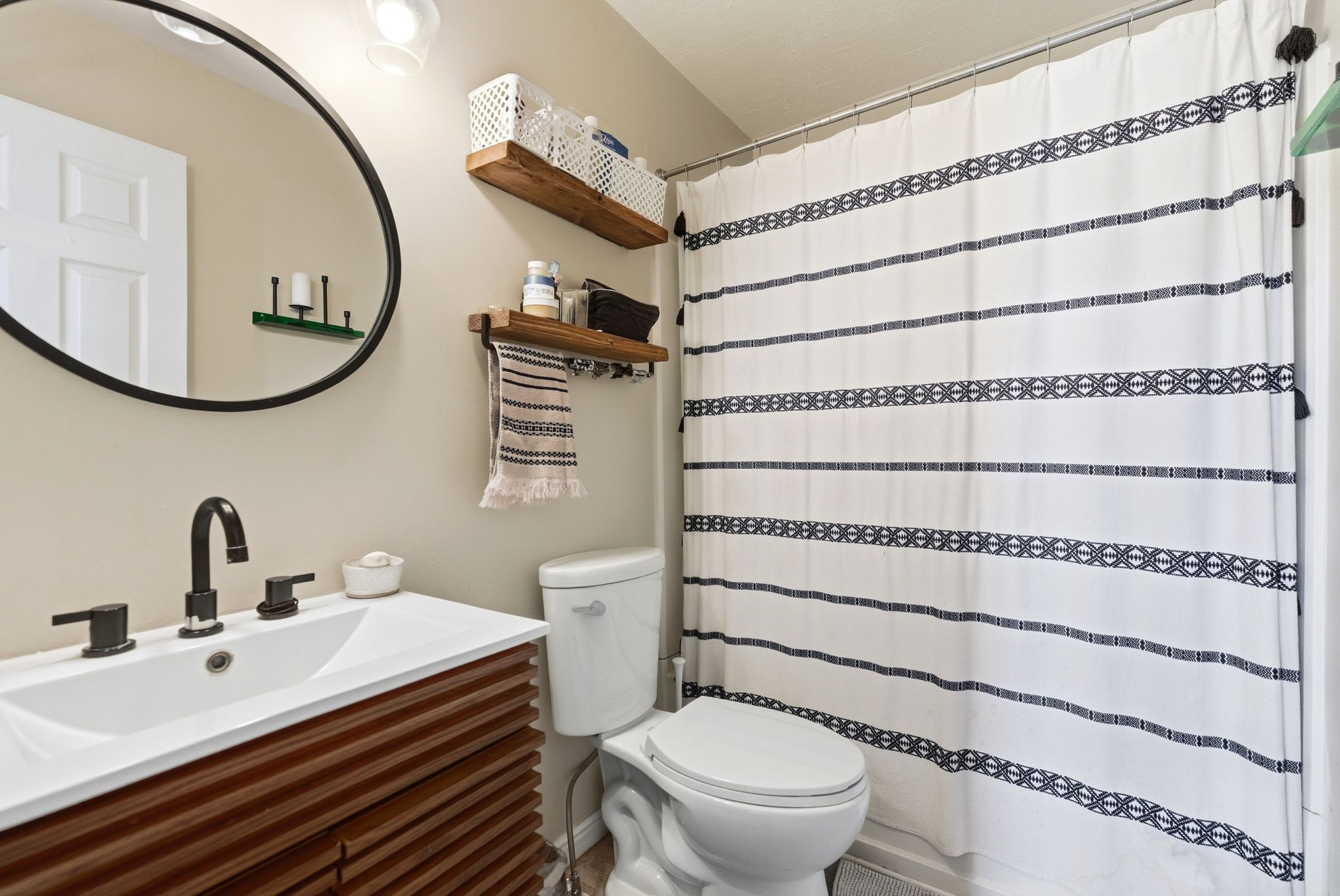 Bathroom with vanity and a shower with curtain