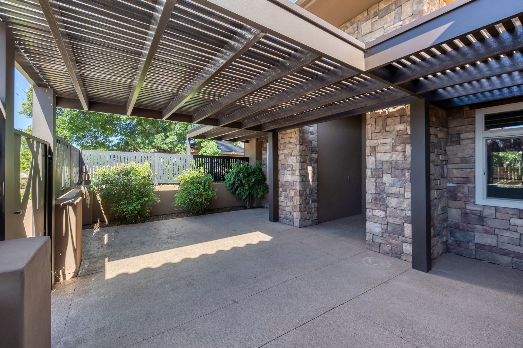 View of patio featuring a pergola