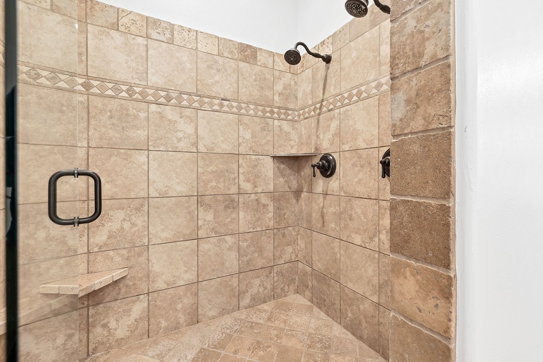 Full bath with a shower stall