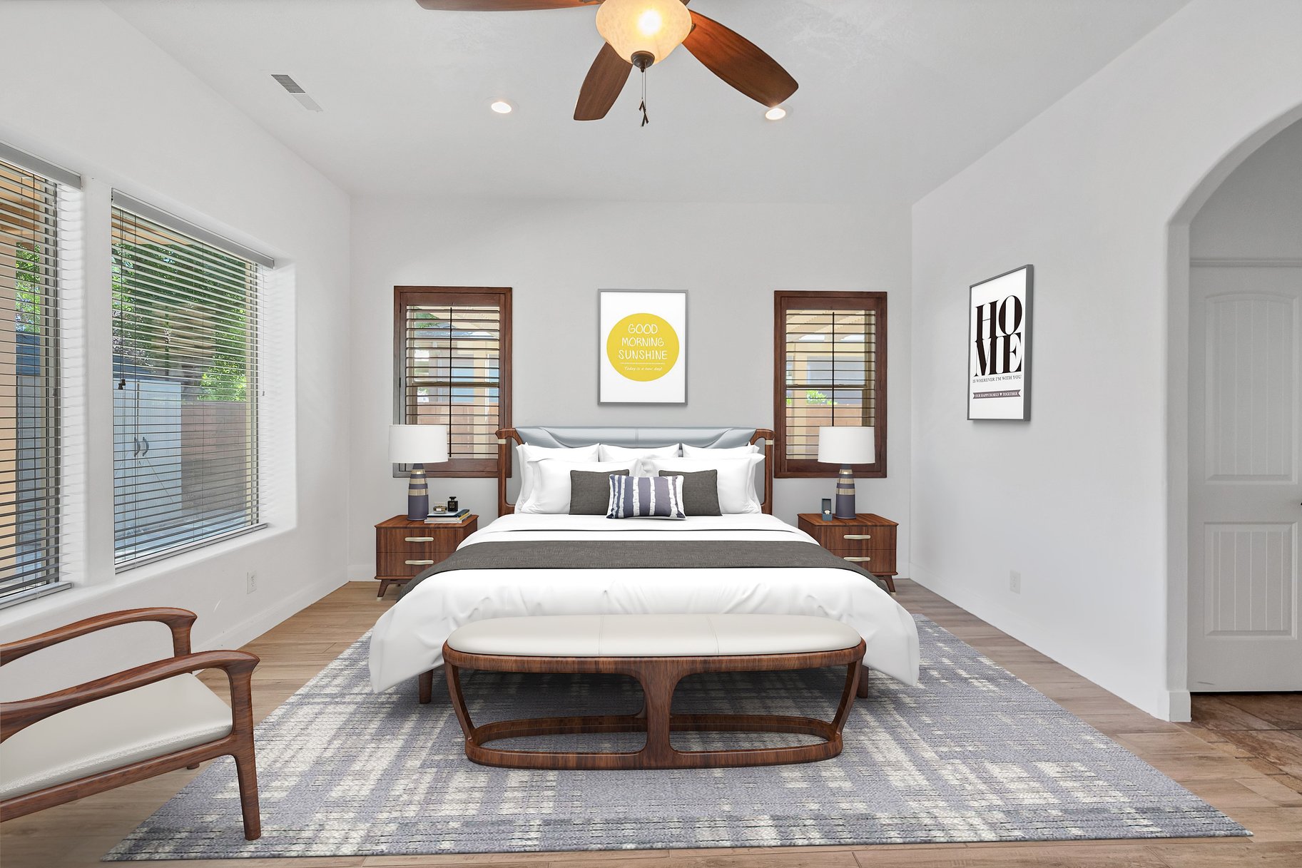 Bedroom with arched walkways, a ceiling fan, light wood-style flooring, and recessed lighting