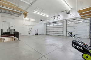 Garage featuring a garage door opener