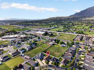 Aerial view of residential area featuring mountains