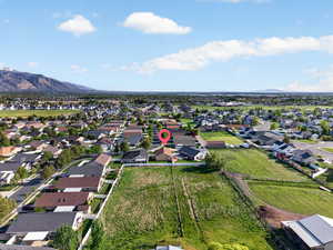 Aerial view of residential area with a mountain backdrop