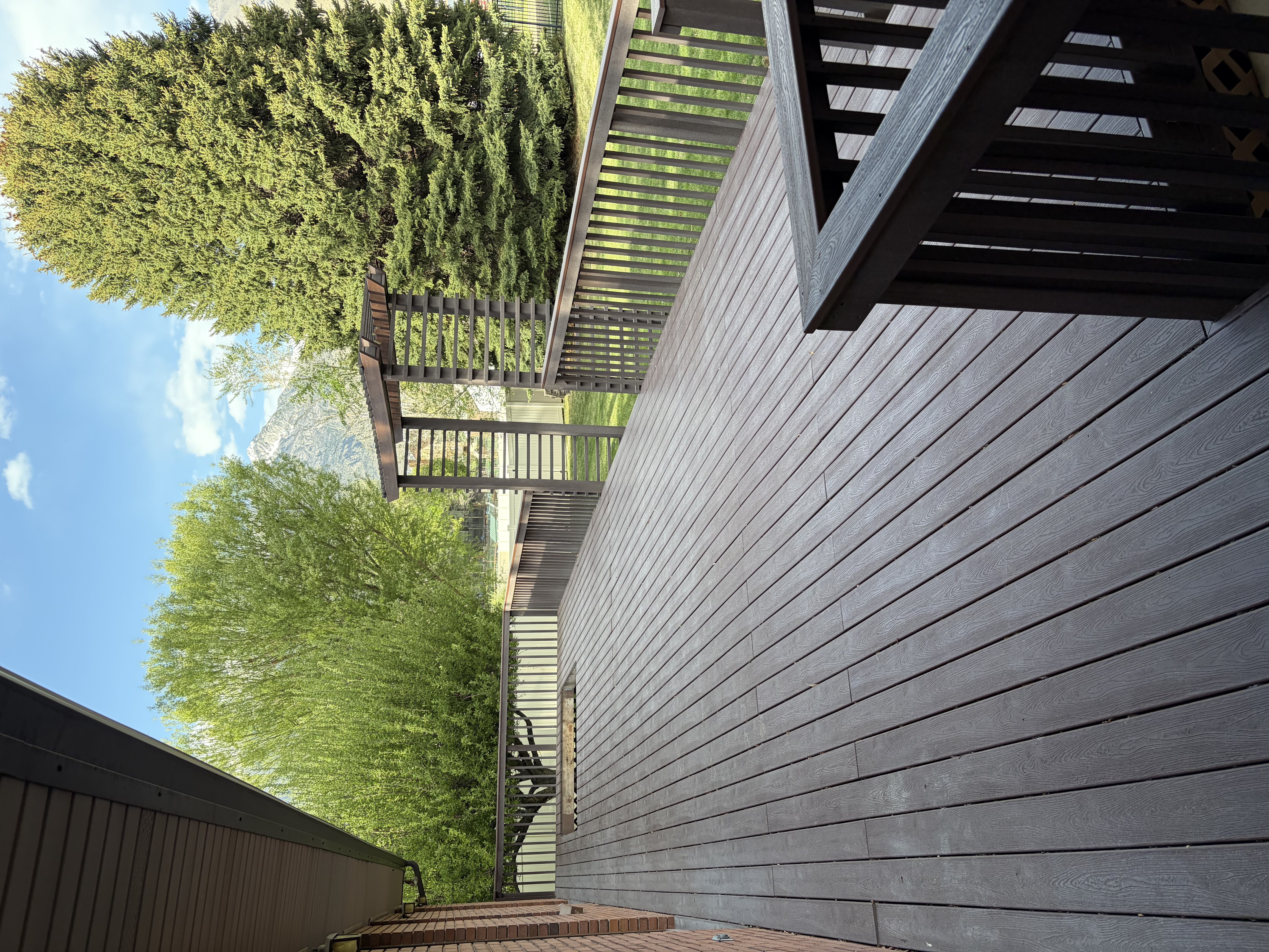 Wooden deck featuring a mountain view