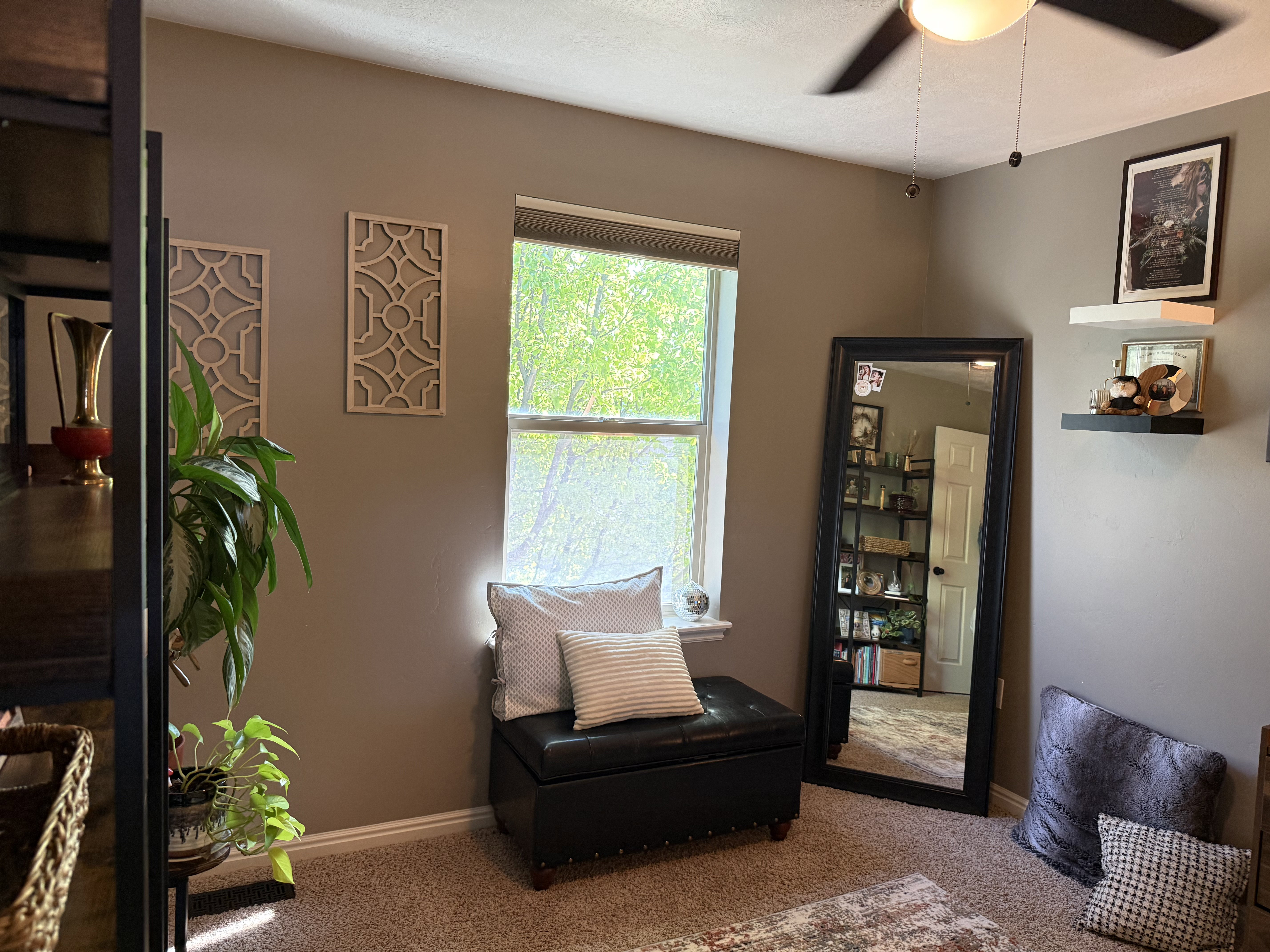 Bedroom featuring carpet and ceiling fan