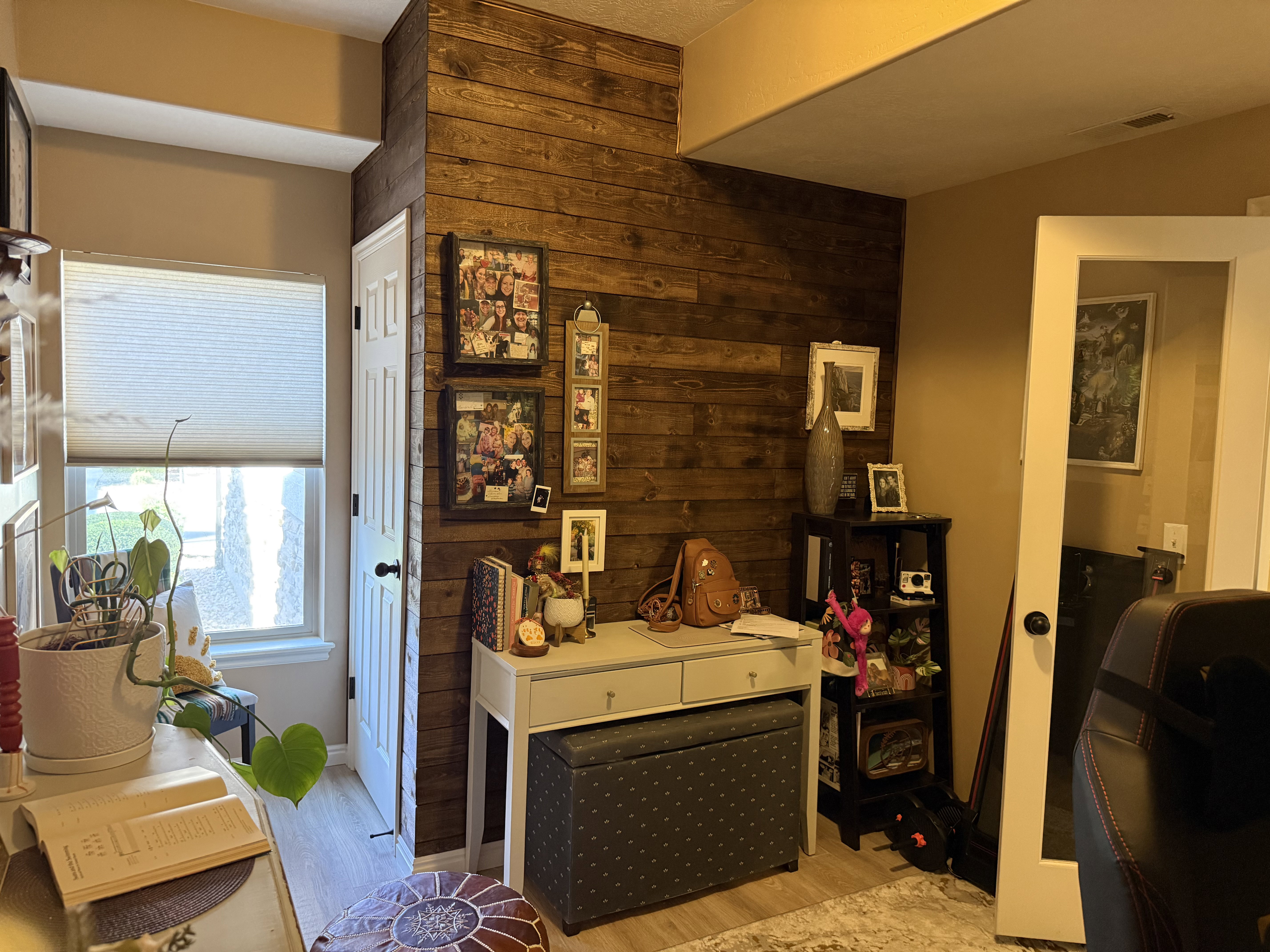 Interior space with wood walls and light wood-style flooring