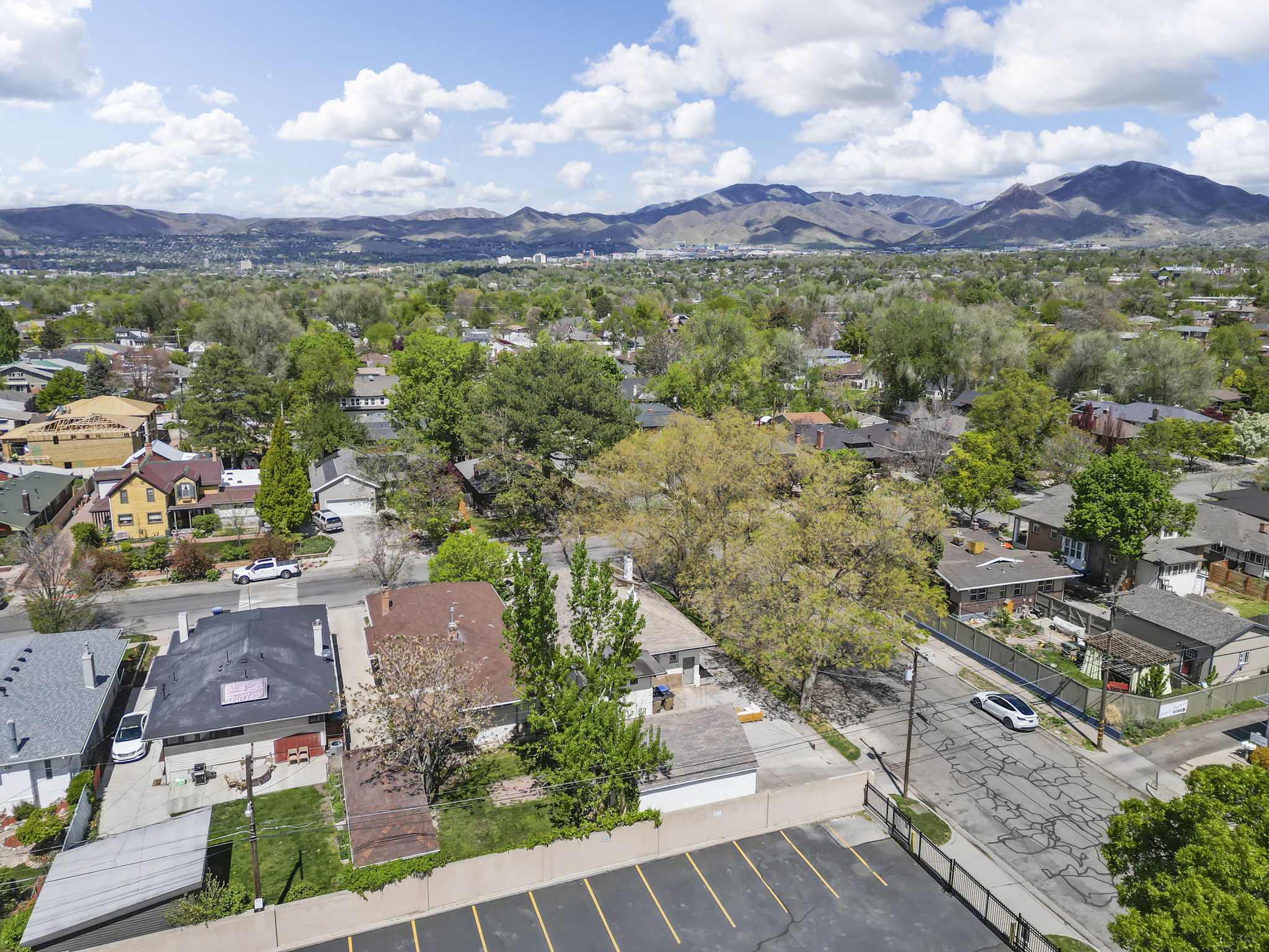 Aerial view of residential area featuring mountains