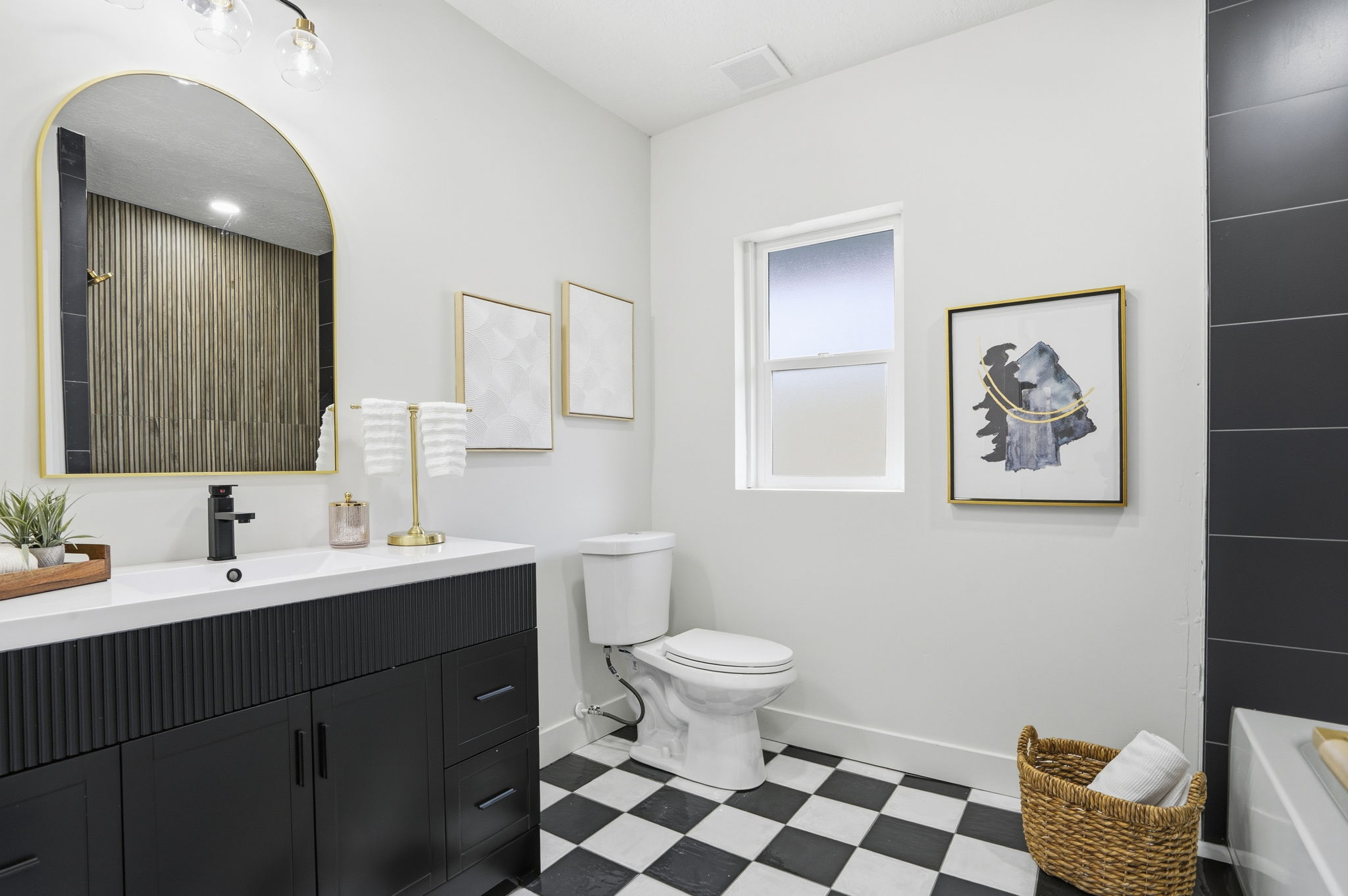 Full bath with vanity, light flooring, a tub to relax in, and a shower