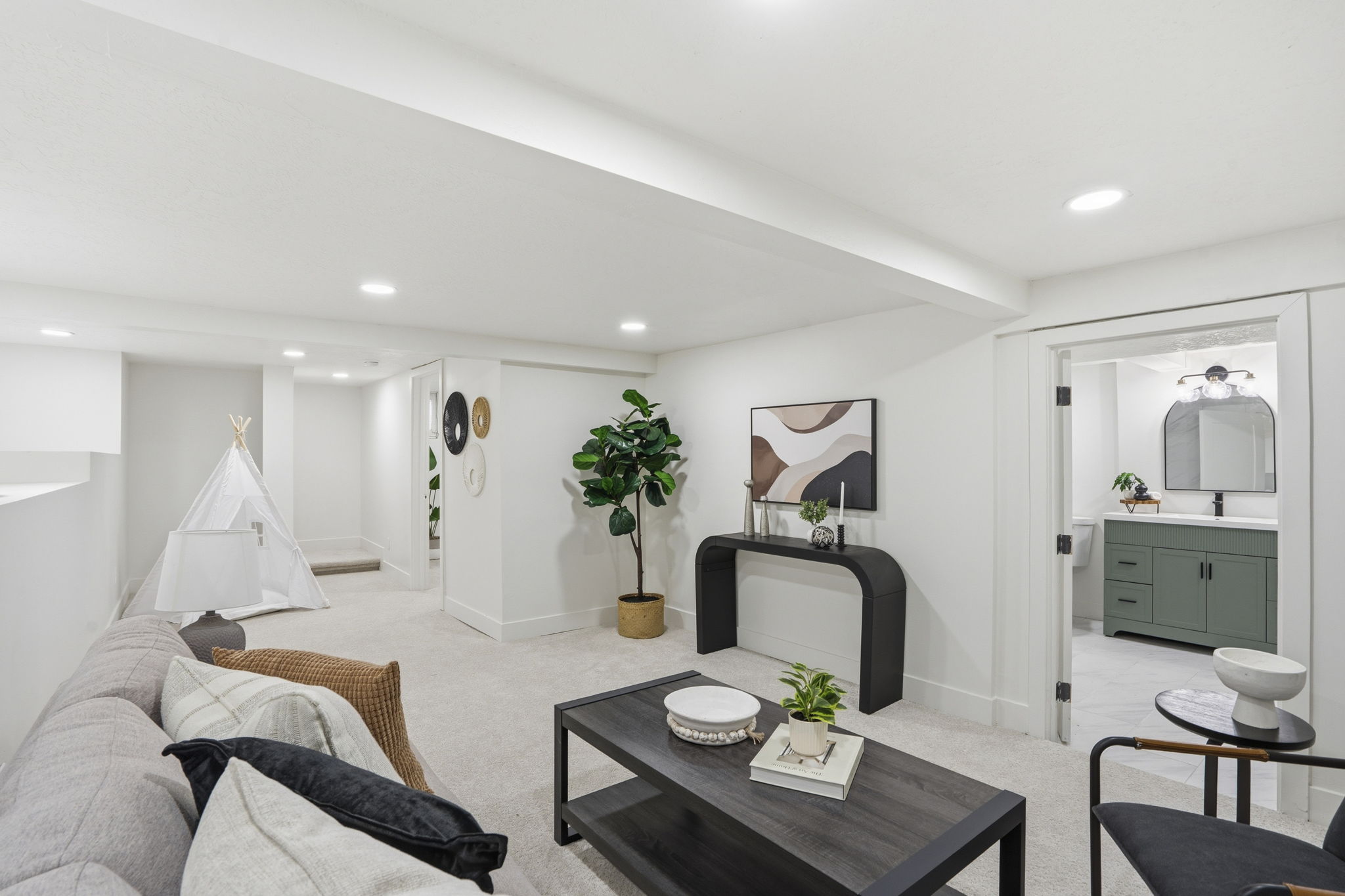 Living room featuring light carpet and recessed lighting