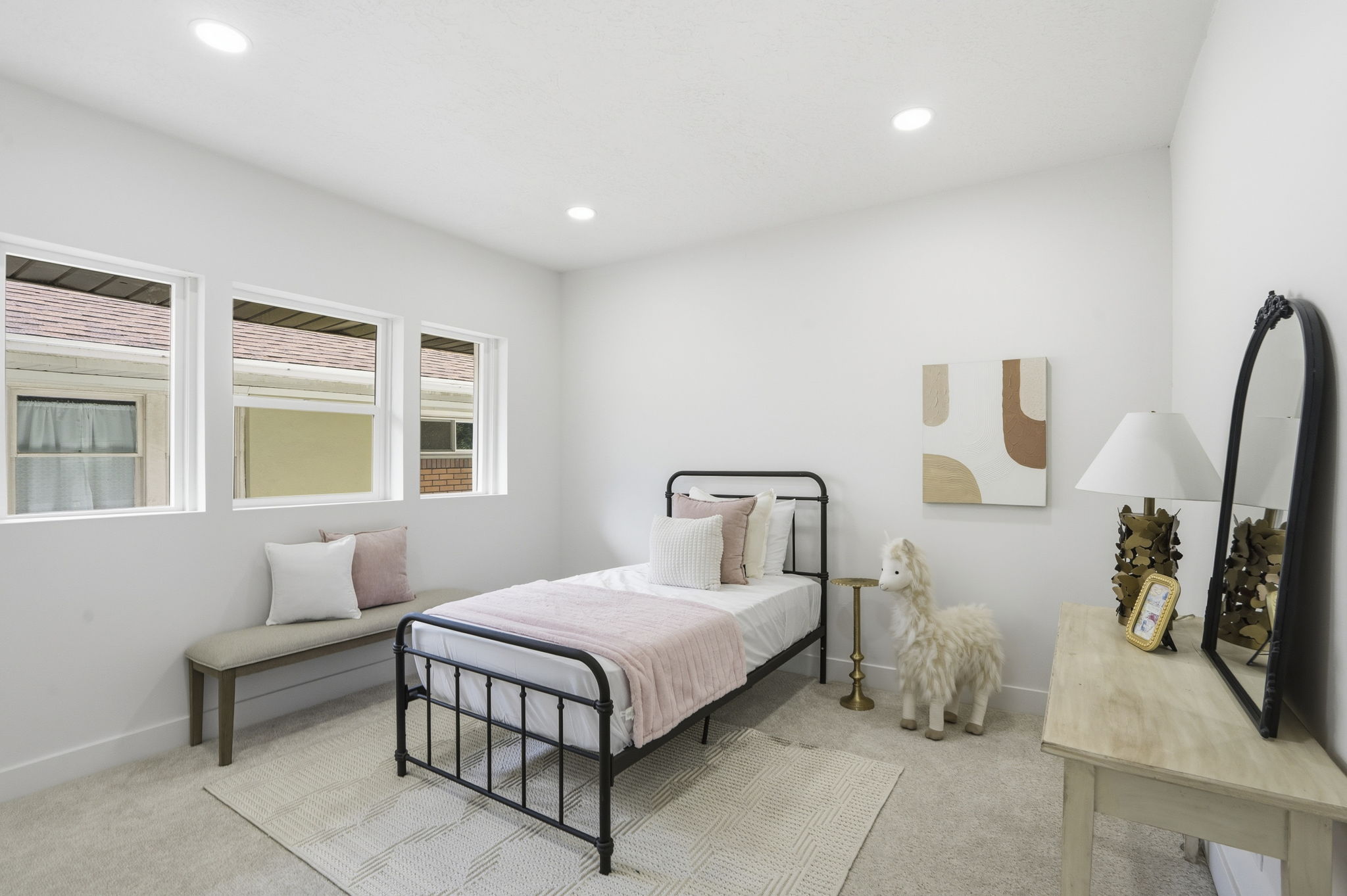 Bedroom featuring light colored carpet and recessed lighting
