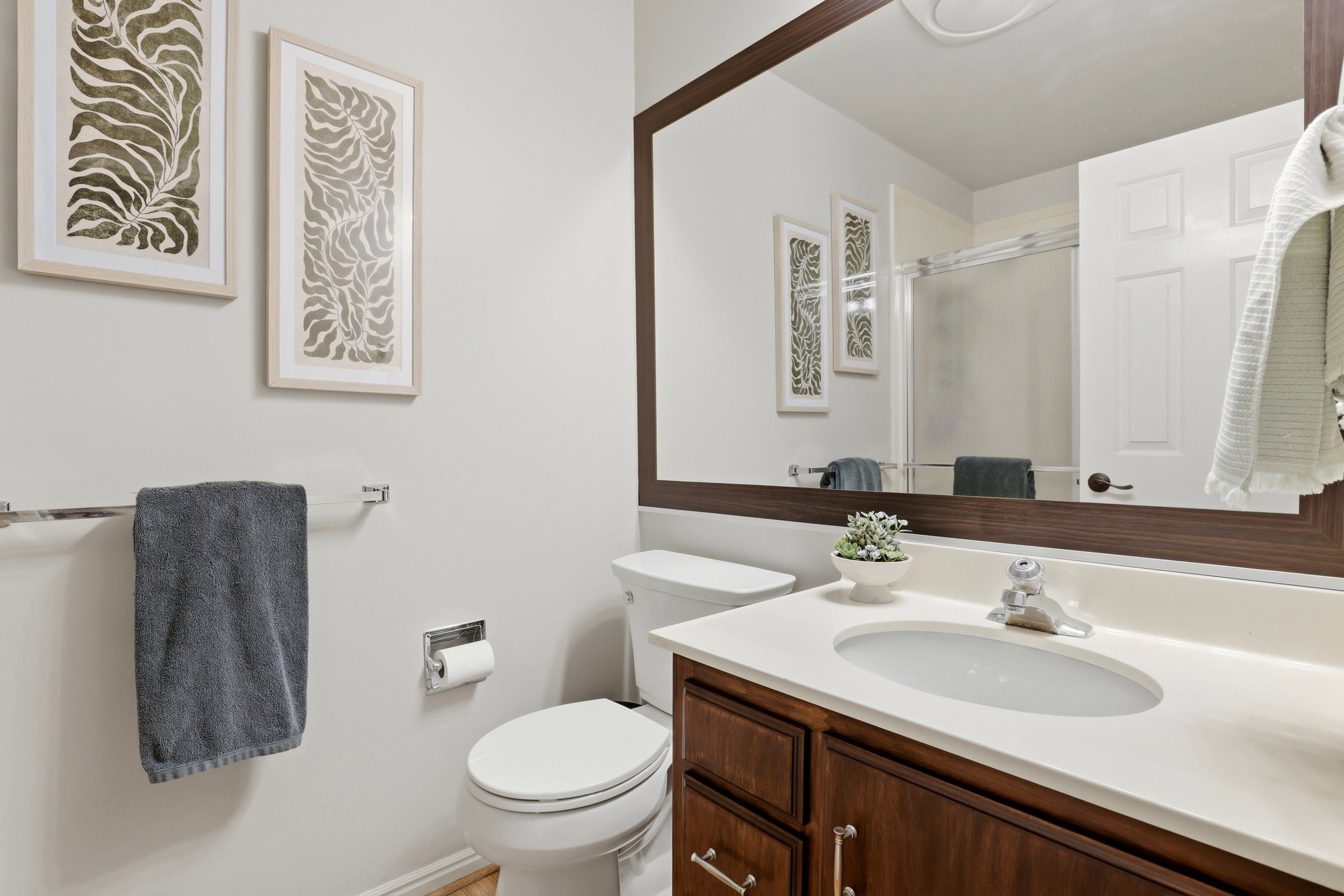 Bathroom featuring vanity and a stall shower