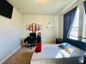 Bedroom TWO featuring carpet flooring and an office area