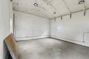 View of heated 20x24 shop with a 15 ft ceiling structure