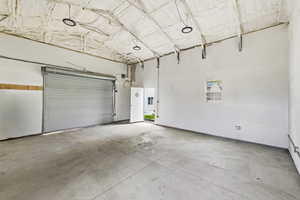 View of heated 20x24 shop with a 15 ft ceiling structure